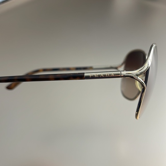Prada sunglasses, tortoise arms with gold Prada logo. One size. - Picture 2 of 3